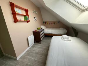 Appartements Sous les toits de la Tavarn Ty Gar : photos des chambres