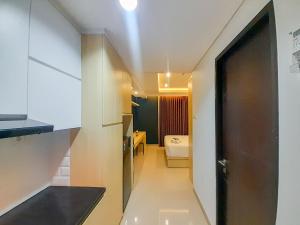 Great Deal and Cozy Studio Patraland Amarta Apartment By Travelio