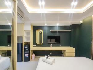 Great Deal and Cozy Studio Patraland Amarta Apartment By Travelio