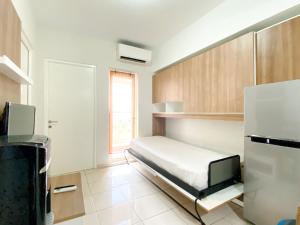 Homey and Nice 3BR at Springlake Summarecon Bekasi Apartment By Travelio