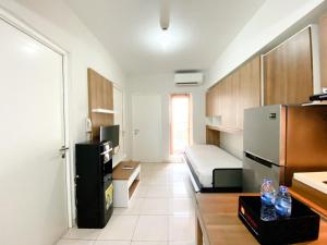Homey and Nice 3BR at Springlake Summarecon Bekasi Apartment By Travelio