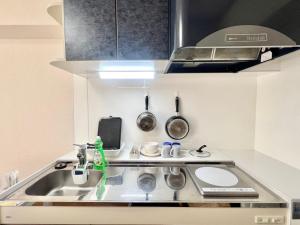 大国町駅徒歩3分 なんば駅1駅 最大6名 ロイヤル602