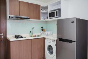 Cozy Living 1BR at M-Town Signature Apartment By Travelio