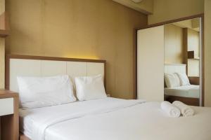 Comfortable and Homey 1BR Apartment at Silkwood Residences By Travelio