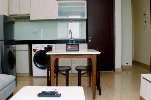 Stunning and Comfortable 2BR at Menteng Park Apartment By Travelio