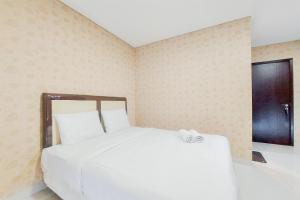 Compact and Homey Studio at Brooklyn Alam Sutera Apartment By Travelio