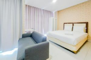Compact and Homey Studio at Brooklyn Alam Sutera Apartment By Travelio