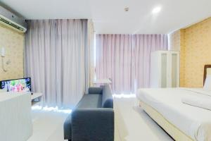 Compact and Homey Studio at Brooklyn Alam Sutera Apartment By Travelio