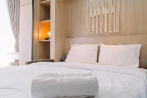 Nice and Fancy Studio at Transpark Bintaro Apartment By Travelio - Mencil