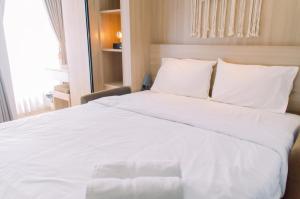 Nice and Fancy Studio at Transpark Bintaro Apartment By Travelio