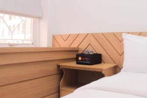 Homey and Cozy Stay Studio Apartment at Patraland Urbano By Travelio