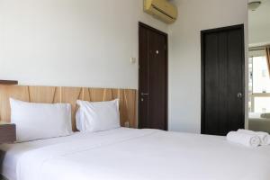 Relaxing 2BR Apartment at Scientia Residence By Travelio