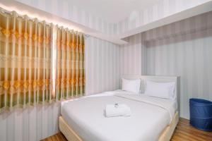 Beautiful 2BR Bassura City Apartment next to Bassura Mall By Travelio