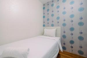 Beautiful 2BR Bassura City Apartment next to Bassura Mall By Travelio