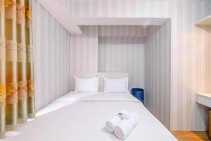 Beautiful 2BR Bassura City Apartment next to Bassura Mall By Travelio