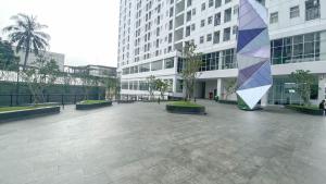 Cozy and Simply Studio at Serpong Garden Apartment By Travelio