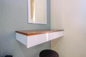 Elegant and Nice Studio at Springlake Summarecon Apartment By Travelio