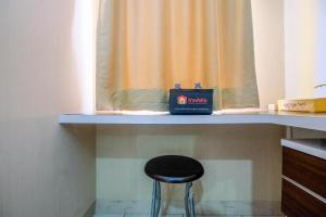 Elegant and Nice Studio at Springlake Summarecon Apartment By Travelio