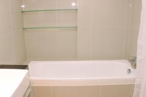 Big and Cozy Studio at Azalea Suites Apartment By Travelio