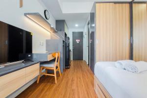 Rare and Cozy Studio with Chic Interior at Serpong Garden Apartment By Travelio