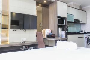 Nice and Fancy Studio Room at Menteng Park Apartment By Travelio