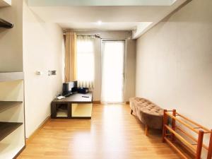 Homey 1BR at Jarrdin Cihampelas Apartment By Travelio
