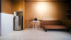 Comfy and Homey 2BR at Bale Hinggil Apartment By Travelio
