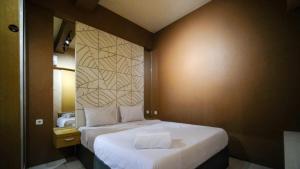 Comfy and Homey 2BR at Bale Hinggil Apartment By Travelio