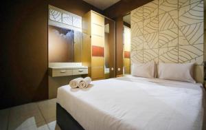 Comfy and Homey 2BR at Bale Hinggil Apartment By Travelio