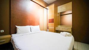 Comfy and Homey 2BR at Bale Hinggil Apartment By Travelio