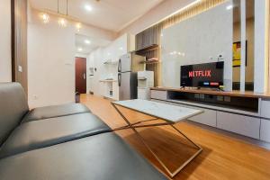 Spacious and Nice 2BR at Sky House BSD Apartment By Travelio