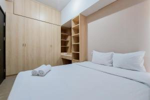 Warm and Simply 1BR at 7th Floor Casa de Parco Apartment By Travelio