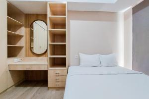 Warm and Simply 1BR at 7th Floor Casa de Parco Apartment By Travelio