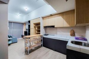 Warm and Simply 1BR at 7th Floor Casa de Parco Apartment By Travelio