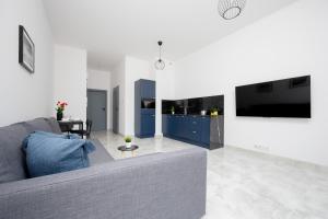 Wyjątkowy Apartament z Uroczym Ogródkiem oraz Parkingiem by Noclegi Renters