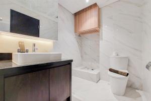 Scenic and Comfortable 1BR Apartment Branz BSD City By Travelio