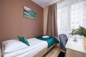Grzegórzecka Family Apartments with Balcony & Parking Cracow by Noclegi Renters