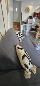 Appartements Maison Plus Belle La Nuit avec jacuzzi prive : photos des chambres