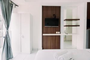 Homey and Good Deal Studio Casa de Parco Apartment By Travelio