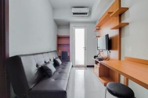 Nice and Comfort 1BR Apartment at Scientia Residence By Travelio