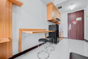 Nice and Comfort 1BR Apartment at Scientia Residence By Travelio