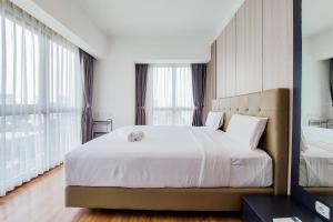 Great Deal and Cozy 2BR at M-Town Signature Apartment By Travelio