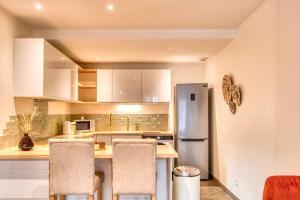Appartements Le Boheme - Climatise - Superbe T2 centre village : photos des chambres