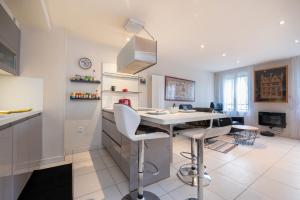 Appartements Le Doumer parking wifi : photos des chambres