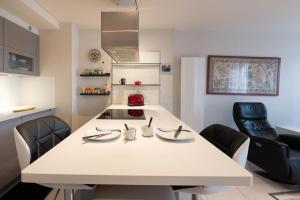 Appartements Le Doumer parking wifi : photos des chambres