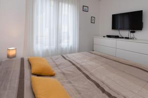 Appartements Le Doumer parking wifi : photos des chambres