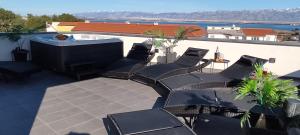 Luxuriöses Penthouse Welle mit Whirlpool, Grill und Meerblick