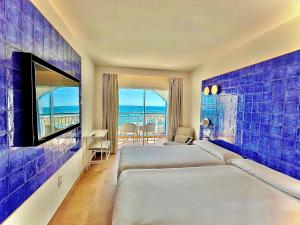 Double or Twin Room with Sea View room in Perla Marina