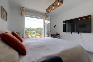 Appartements 067 - Juvignac T2, Golf, Piscine, Clim, Parking : photos des chambres