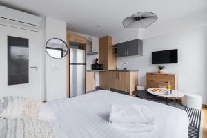 Appartements Studio lumineux avec terrasse Courbevoie - 2P - FLAT-GUEST : photos des chambres